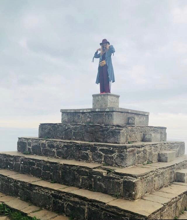 P Susan Jackson at the top of a pyramid in Ireland.